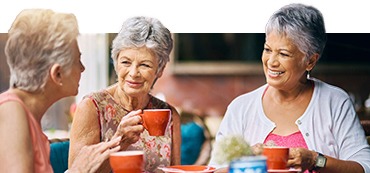 Three women having a coffee together