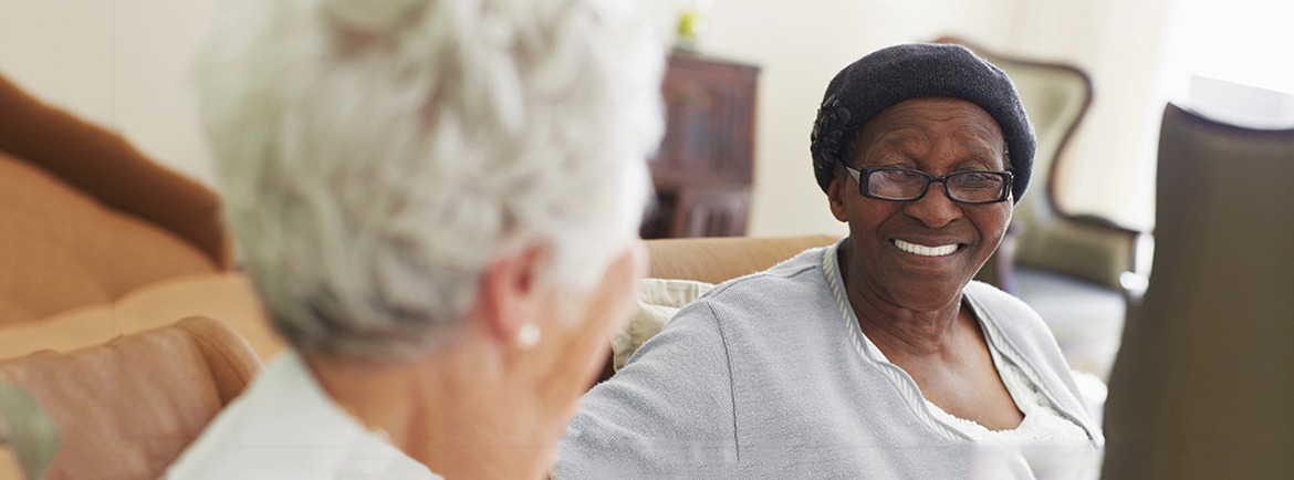 Two elderly women sitting together